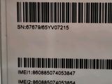 a close up of a bar code on the back of a cell phone