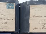 two old envelopes sitting on top of each other