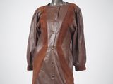 brown leather dress with brown leather panels on a mannequin mannequin mannequin mannequin mannequin mannequin mannequin manne