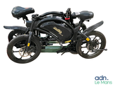 a black motorcycle that is parked on a white background