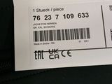 a label on the back of a suitcase that has a price tag attached to it