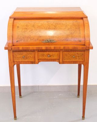an old wooden desk with drawers and a drawer underneath it