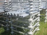a lot of pipes that are sitting in the grass