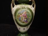 a green vase with a picture on it on a black background