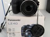 a camera sitting on top of a box on a table