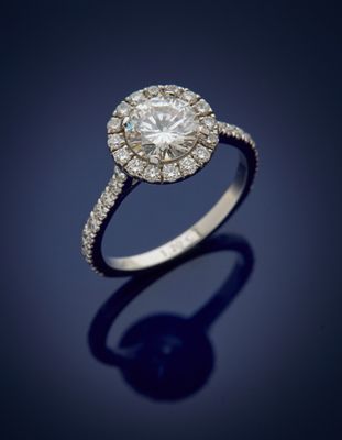 a diamond and platinum ring, by business