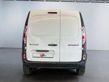 a white van that is parked in a garage