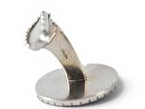 a silver ring with a horse head on top of it