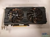 a close up of a video card with two fans on top of it