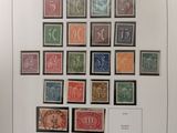 an image of a picture of a bunch of stamps on a table