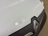 a close up of a car ' s hood with a sticker on it