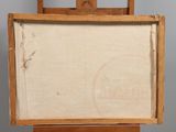 an old wooden easel with a painting on top of it