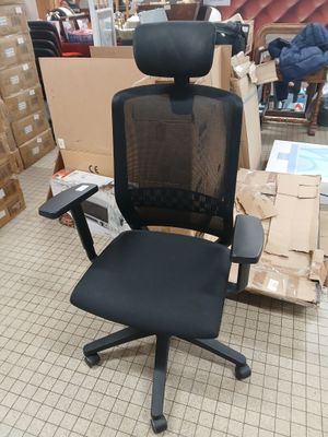 a black office chair with a black seat and back rest