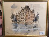 une photo d'un tableau représentant un château, dans un cadre