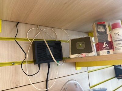 a shelf that has a radio and other items on it