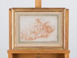 an old picture of a man riding a horse on a wooden easel