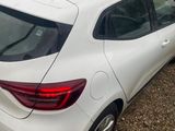 a white car parked on the side of the road
