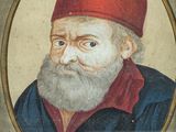 portrait of an old man with a red hat and a beard