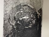 a black and white photo of a black and white picture of a clock