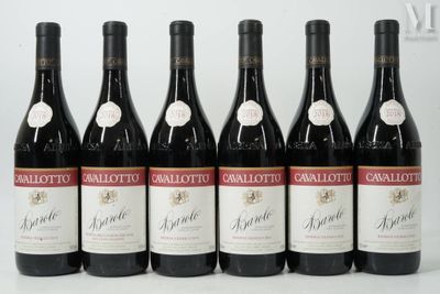 six bottles of red wine are lined up on a table