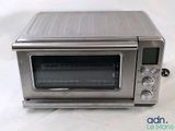 an image of a toaster oven sitting on a table