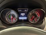 a close up of a car dashboard with various gauges