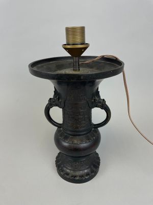 a lamp that is sitting on top of a table