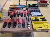 a table with many tools on it in the room