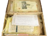 a suitcase with papers and papers inside of it