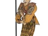 statue of a man with a guitar and a bird on his head