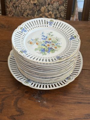 several plates stacked on top of each other on a wooden table