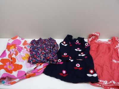 a lot of clothes that are on a table
