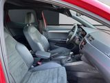a red car with two seats and a steering wheel