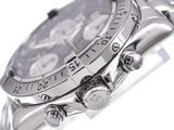 a close up of a watch on a white surface