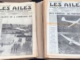 two pages of a newspaper with a picture of a plane on it