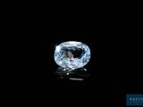 a blue diamond on a black background