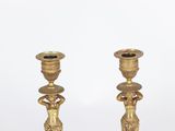 pair of antique brass candlesticks on marble base