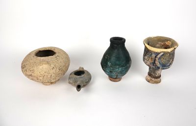 several different types of vases are displayed on a white surface