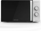 une image d'un four à micro-ondes sur fond blanc