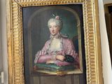 a painting of a woman sitting at a table with a cat in her lap