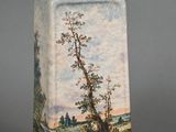 a vase with a painting of a tree on it