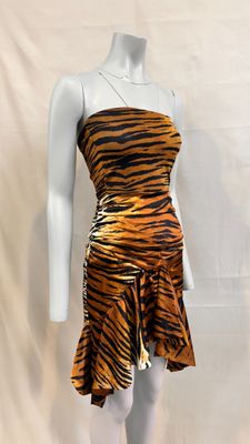 an image of a mannequin dressed in a tiger print dress
