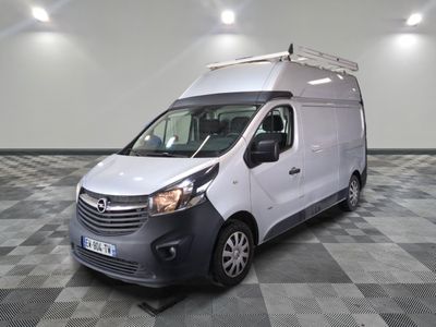 a picture of a white van parked on a checkered floor