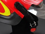 a fireman helmet with a safety belt attached to it