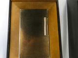 a black box with a lighter inside of it