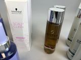 many different types of skin care products sitting on a table