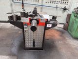 a machine that is sitting on the ground in the garage