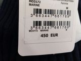 a label on the back of a sweater that says marine
