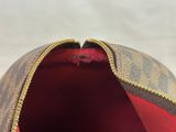 a close up of the inside of a louis vuitton bag