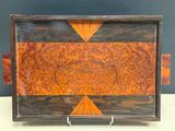 an image of a wooden tray with a decorative design on it